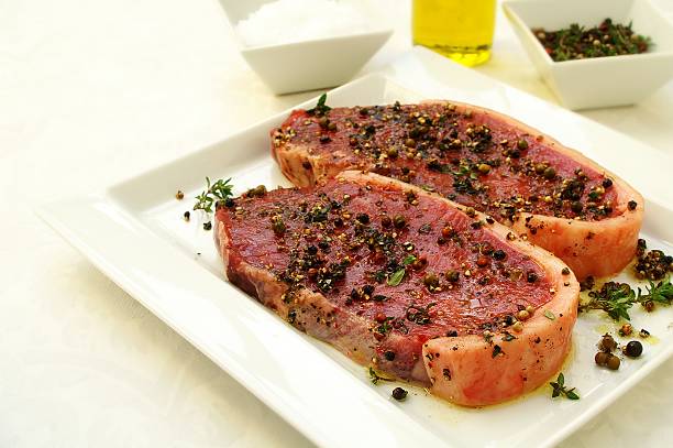 istock sirloin steaks on white plate 177697638
