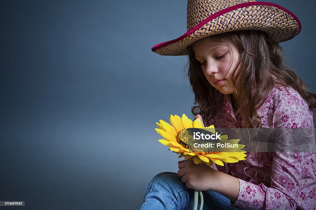 young cowgirl in studio Adult Stock Photo