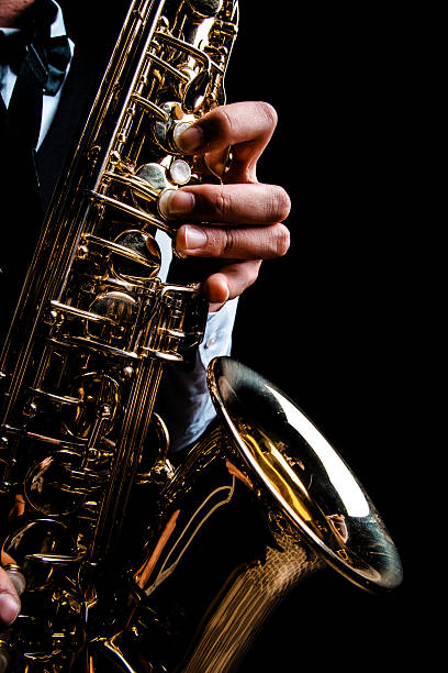 saxophone player - hqlypse fotografías e imágenes de stock