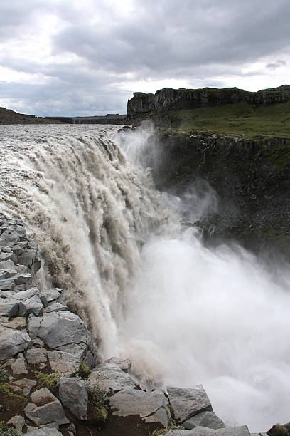 Iceland Dettifoss - largest waterfall in Europe in terms of volume discharge. Jokulsa a Fjollum river in Jokulsargljufur National Park. Iceland. barron gorge national park stock pictures, royalty-free photos & images