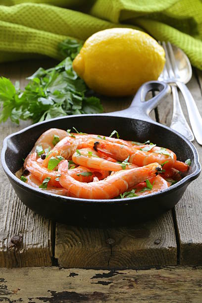 istock shrimp fried with herbs and spices in  pan 177701385