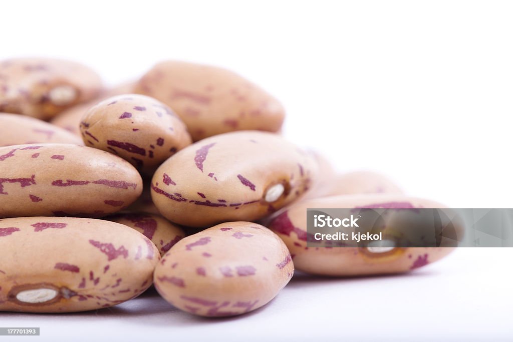 Organic Borlotti Beans Raw Organic cranberry bean on white background. Borlotto Bean Stock Photo