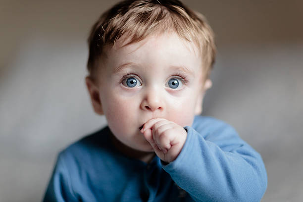 istock cute baby with blue eyes 177701575