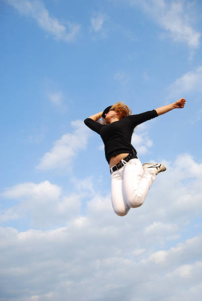 istock Young girl jumping into the air 177701771