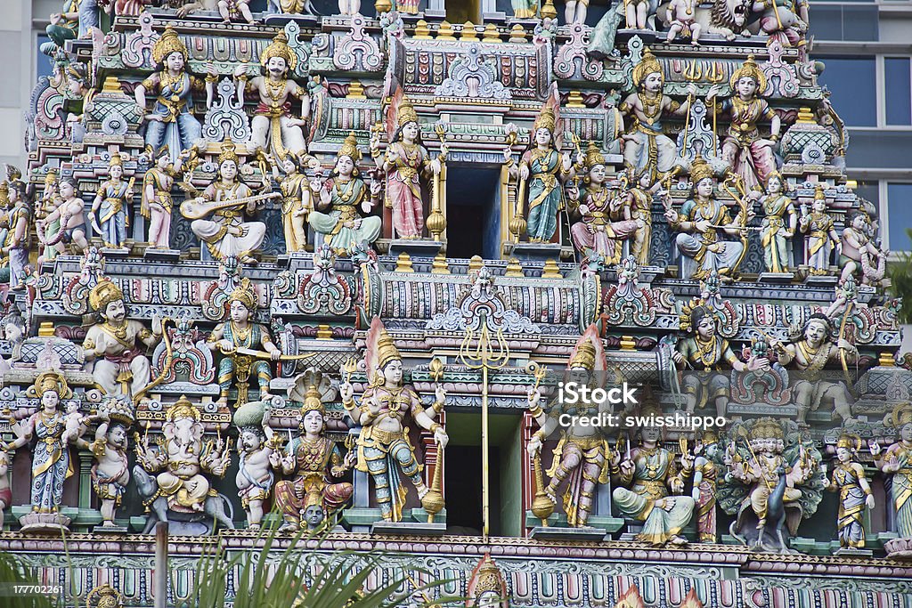 Hindu temple in Singapore Fragment of decorations of the Hindu temple Sri Mariamman in Singapore Ancient Stock Photo