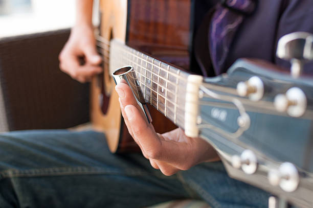 istock Teenage Boy playing Acoustic Guitar 177702476