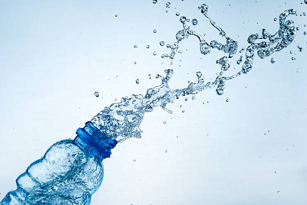 istock Water splash out of glass 177702636