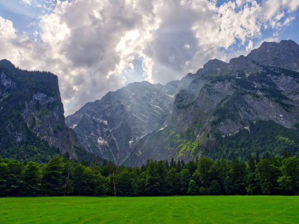 istock Sunbeams casting over mountains and meadow 1777027488