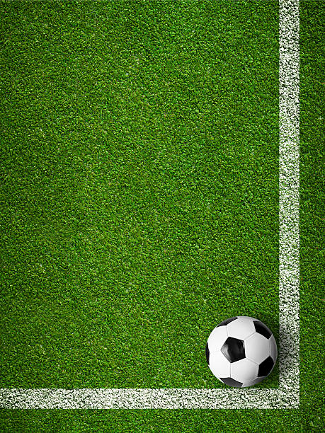 футбольный мяч в обрамлении белых линии маркировки вид сверху - corner marking фотографии стоковые фото и изображения