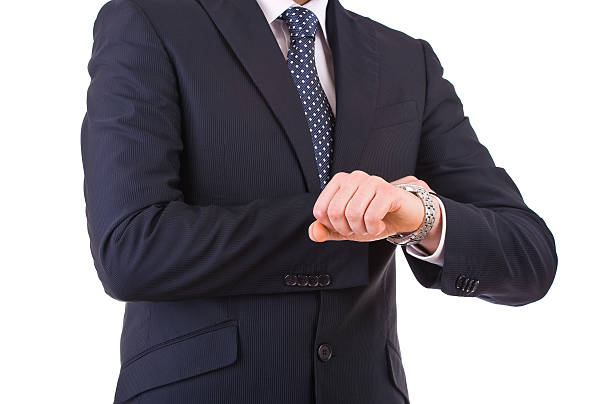 istock Businessman checking time on his wristwatch. 177704364