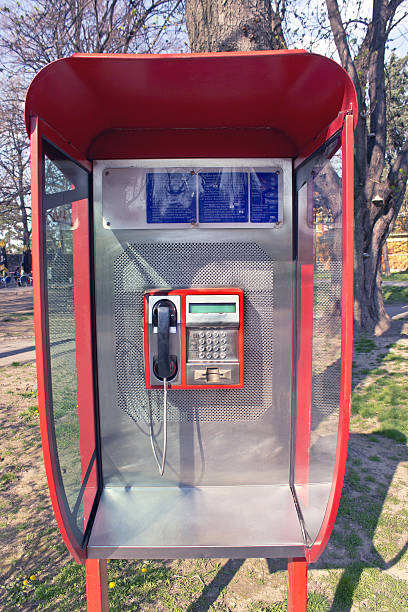 istock Orange public telephone on metallic background 177705849