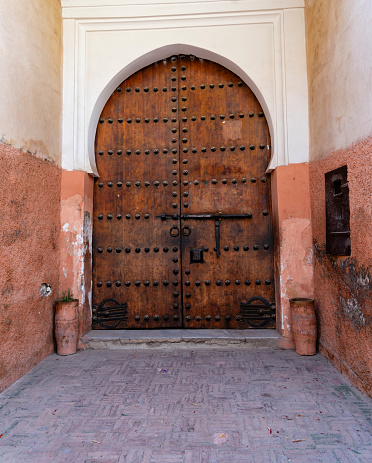 Antique door in the medina of Marrakech, Morocco