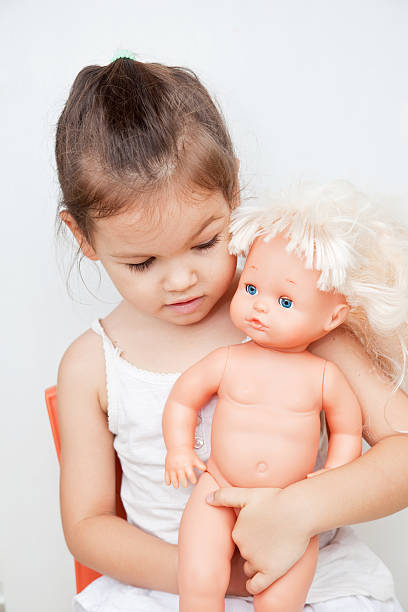 istock The Girl with a Doll 177706014