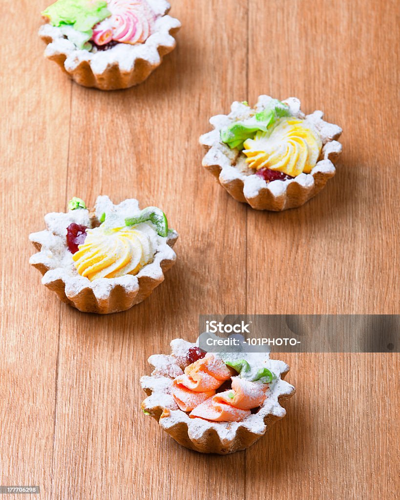 four delicious cream basket sprinkled powdered sugar four delicious cream basket sprinkled powdered sugar standing table Aromatherapy Stock Photo