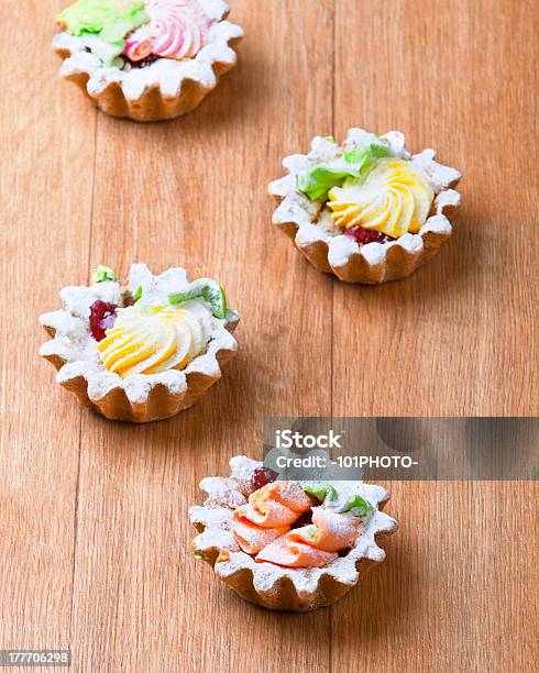 Four Delicious Cream Basket Sprinkled Powdered Sugar Stock Photo - Download Image Now