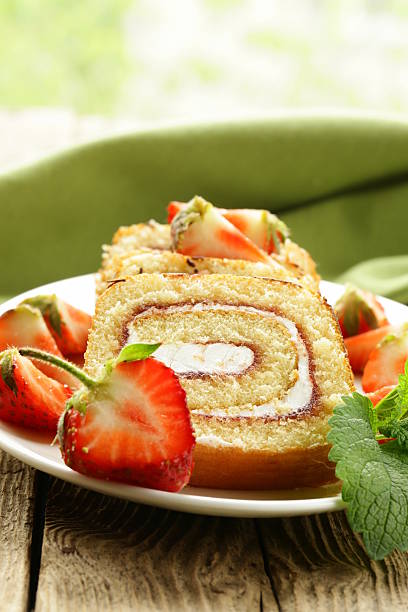 istock roulade cake with cream and strawberries 177706366
