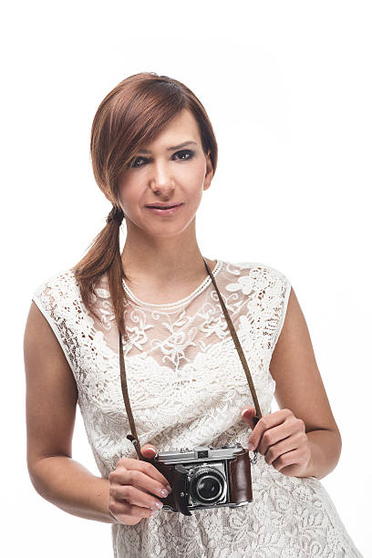 istock Beautiful young female photographer 177706505