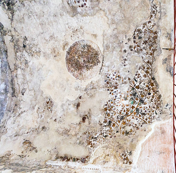 Ancient painted plaster on the ceiling of one of the caves in Little Petra, Jordan