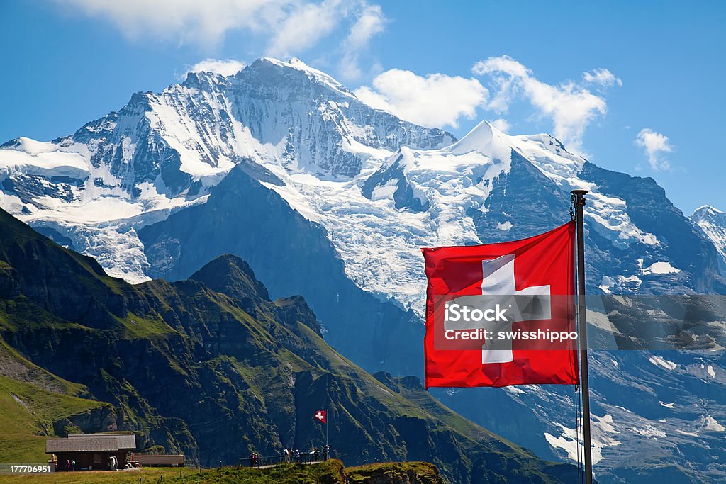 Swiss flag Swiss flag on the top of Mannlichen (Jungfrau region, Bern, Switzerland) Aletsch Glacier Stock Photo