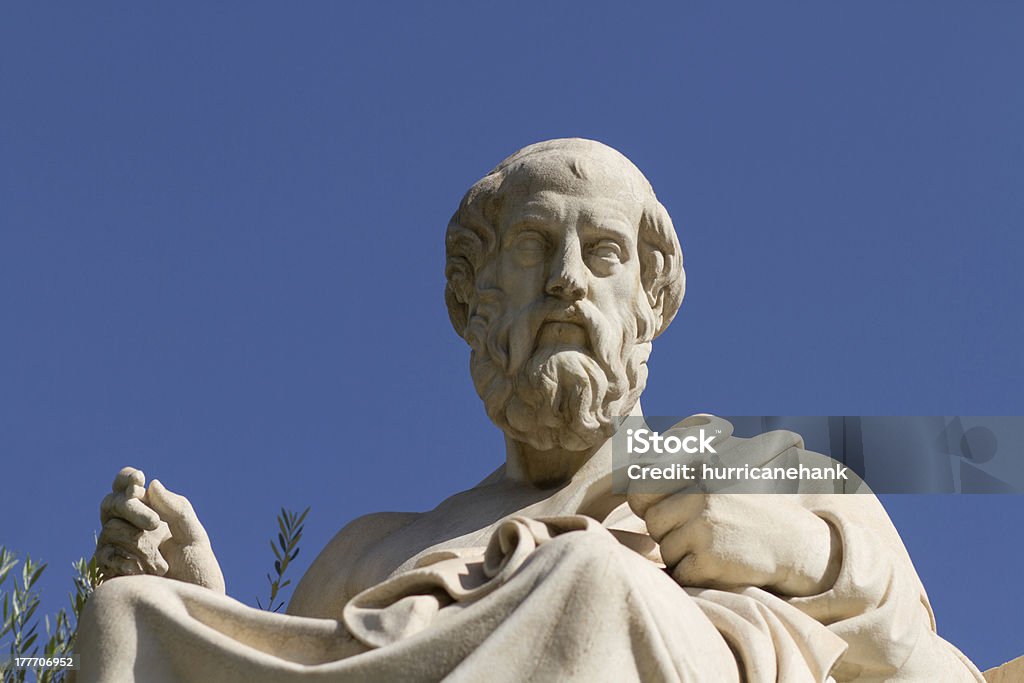 Statue of Plato in Greece Plato, Greek philosopher. A disciple of Socrates and the teacher of Aristotle, he founded the Academy in Athens. This is his statue, located before the Academy of Athens, Greece. Aristotle Stock Photo