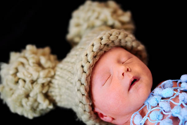 istock Sleeping baby in a funny hat 177708313