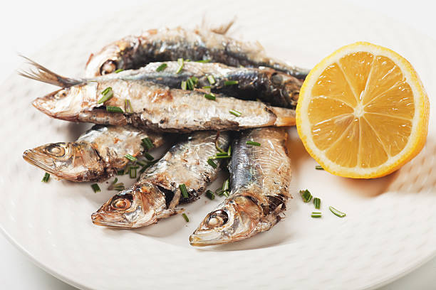 istock Grilled sardine fish with lemon and herbs 177708485