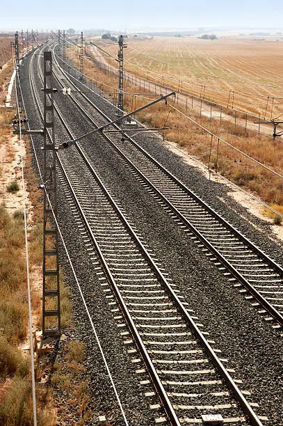 Rail road across spanish country side vertical