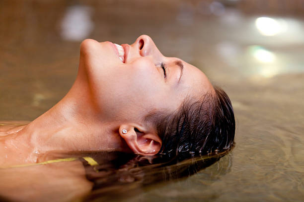 istock Young woman in a hot tub 177710102