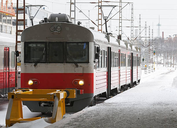istock Perspective view of old-fashioned electric express train on a platform 177710248