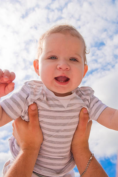 istock baby and sky in the background 177710416