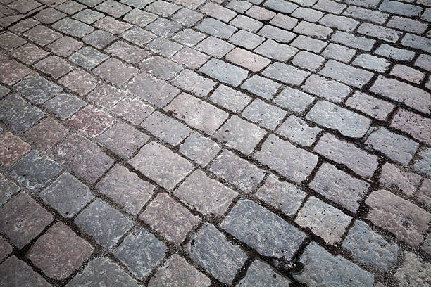 istock Background texture of old granite cobblestone road 177710585