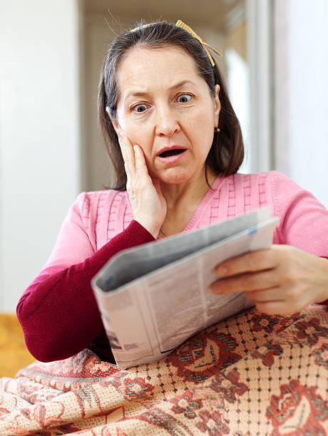 istock woman having grief  after readed news 177710679