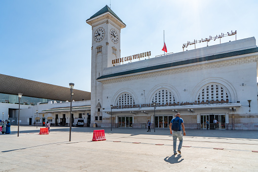 Casablanca, Morocco - Sep. 12 2023: Casa-Voyageurs railway station (Arabic: محطة الدار البيضاء المسافرين‎) is an ONCF station in the city centre. The station is served by suburban and long-distance trains. Morocco flags flown at half-mast to mourn earthquake victims.