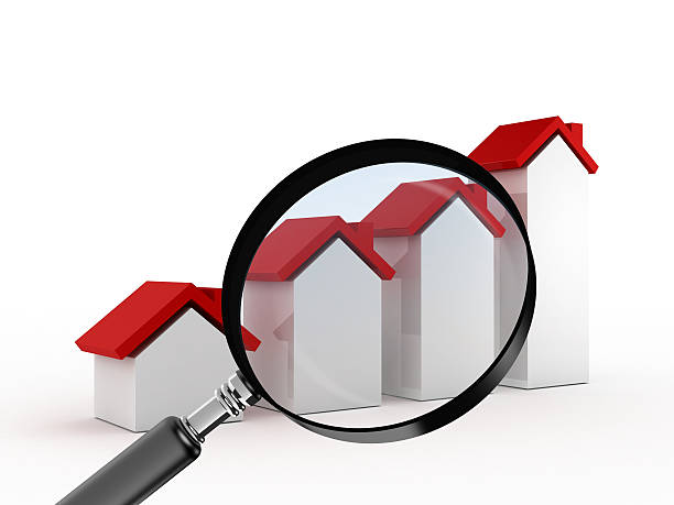 istock Growth in Real Estate with Magnifying Glass 177710883