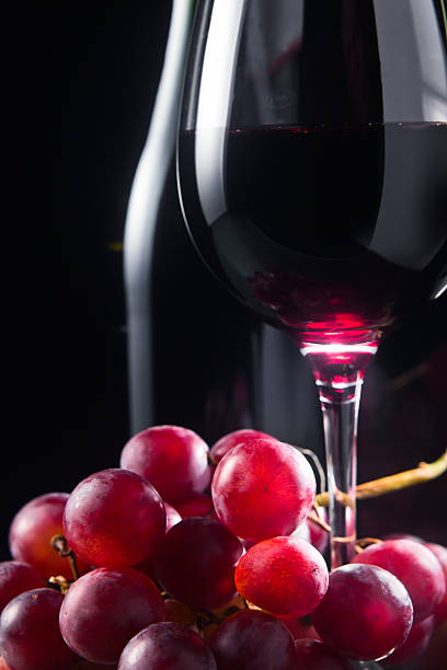 istock grape and glass with red wine 177711358