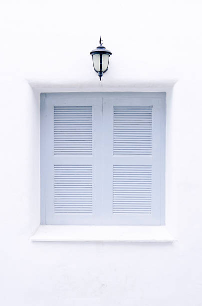 istock Gray windows and classic lamp on white wall 177711533