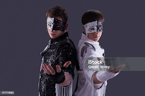 Portrait Of Attractive Young Guys In Masks Stock Photo - Download Image Now - Adult, Backgrounds, Beautiful People