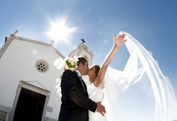 grooms couple kissing