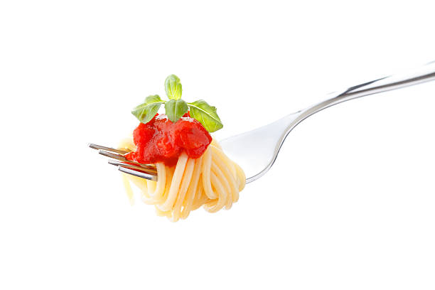 istock Spaghetti pasta with tomato sauce and basil on fork 177712622