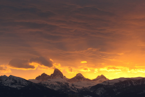 A colorful sunrise greets Teton Valley on a winter morning.