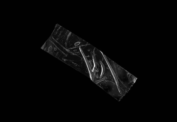 istock adhesive plastic tape isolated on black background 1777136076