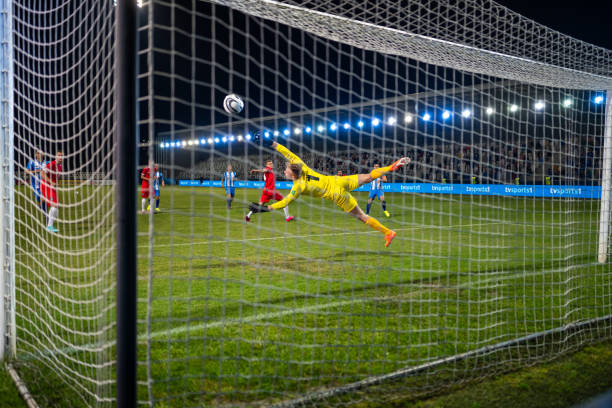 istock Soccer goalkeeper catching ball 1777139478