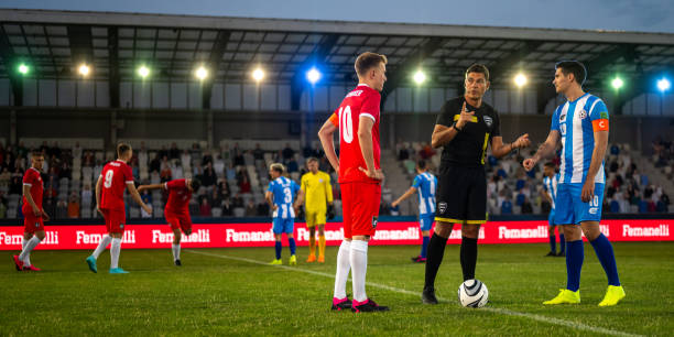 istock Soccer team captains flipping coin 1777139553