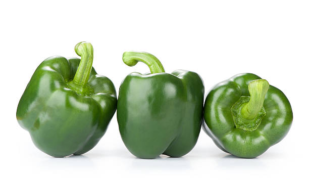 istock Green peppers isolated on white background 177715757