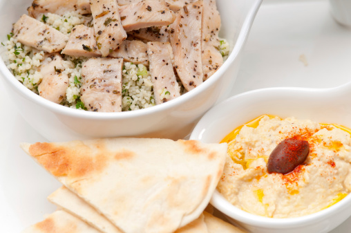 fresh traditional arab taboulii couscous with hummus