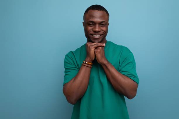 istock A 30 year old dark-skinned American man dressed in a basic T-shirt poses in front of copy space. lifestyle concept 1777163680