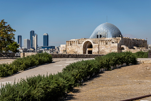 The Umayyad Palace, located on the Citadel Hill of Amman with the modern buildings of Jordan in the background.