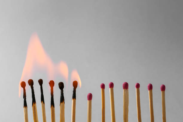 istock Burning and whole matches on light grey background. Space for text 1777167218