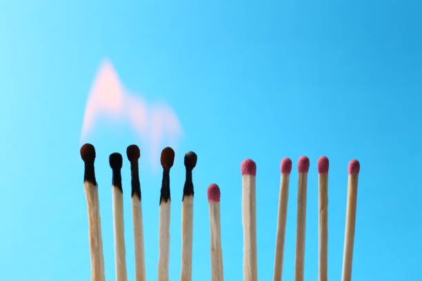istock Burning and whole matches on light blue background. Space for text 1777169931