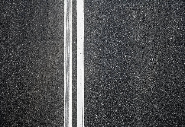 istock Close-up texture of an asphalt road with marking 177717929